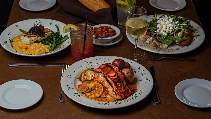 Three plated entrees with focus onStrawberry BBQ Salmon entree